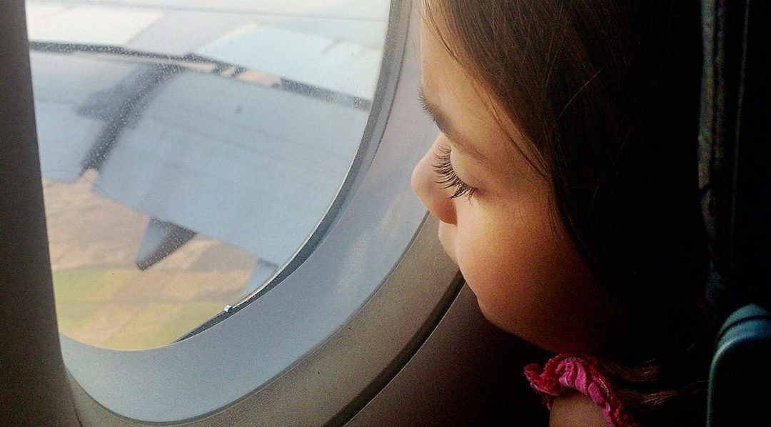 11 Essential Survival Tips for Flying with Kids